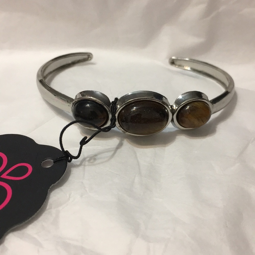 Silver cuff with Tiger's Eye gems